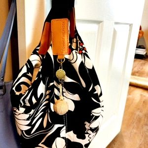 Brand new large  Tommy Hilfiger hobo bag magnetically closes mint